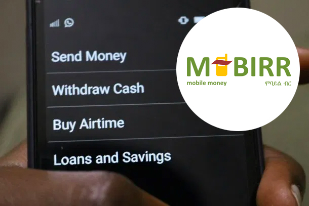 M-Birr company logo overlaid on image of someone using a mobile banking service on a smartphone.